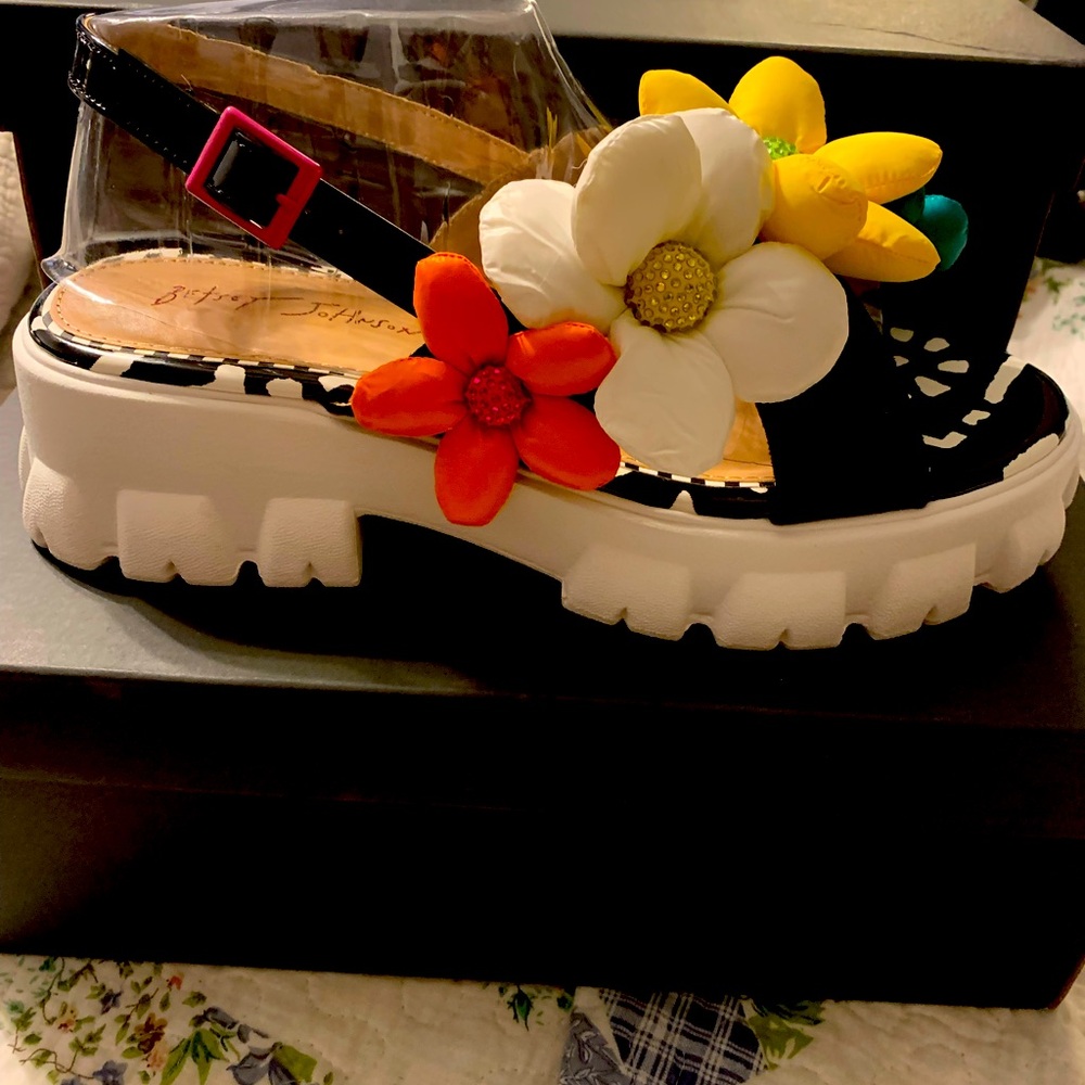 Never worn. I ordered wrong size. So very cute !